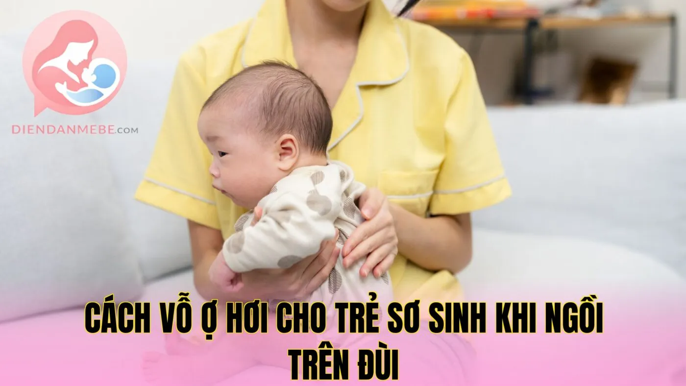 Cách vỗ ợ hơi cho trẻ sơ sinh khi ngồi trên đùi